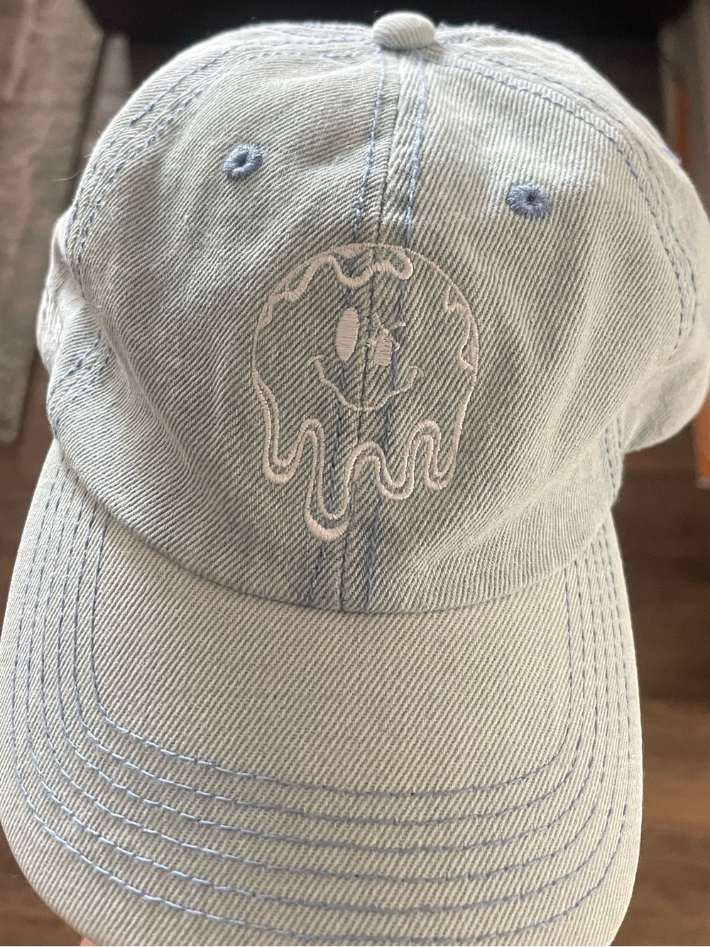 Dutch Bros Light Blue Drip Smiley Cap